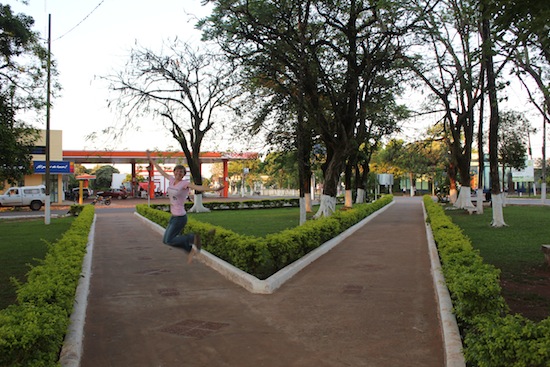Allison jumping in plaza in Yuty, Paraguay